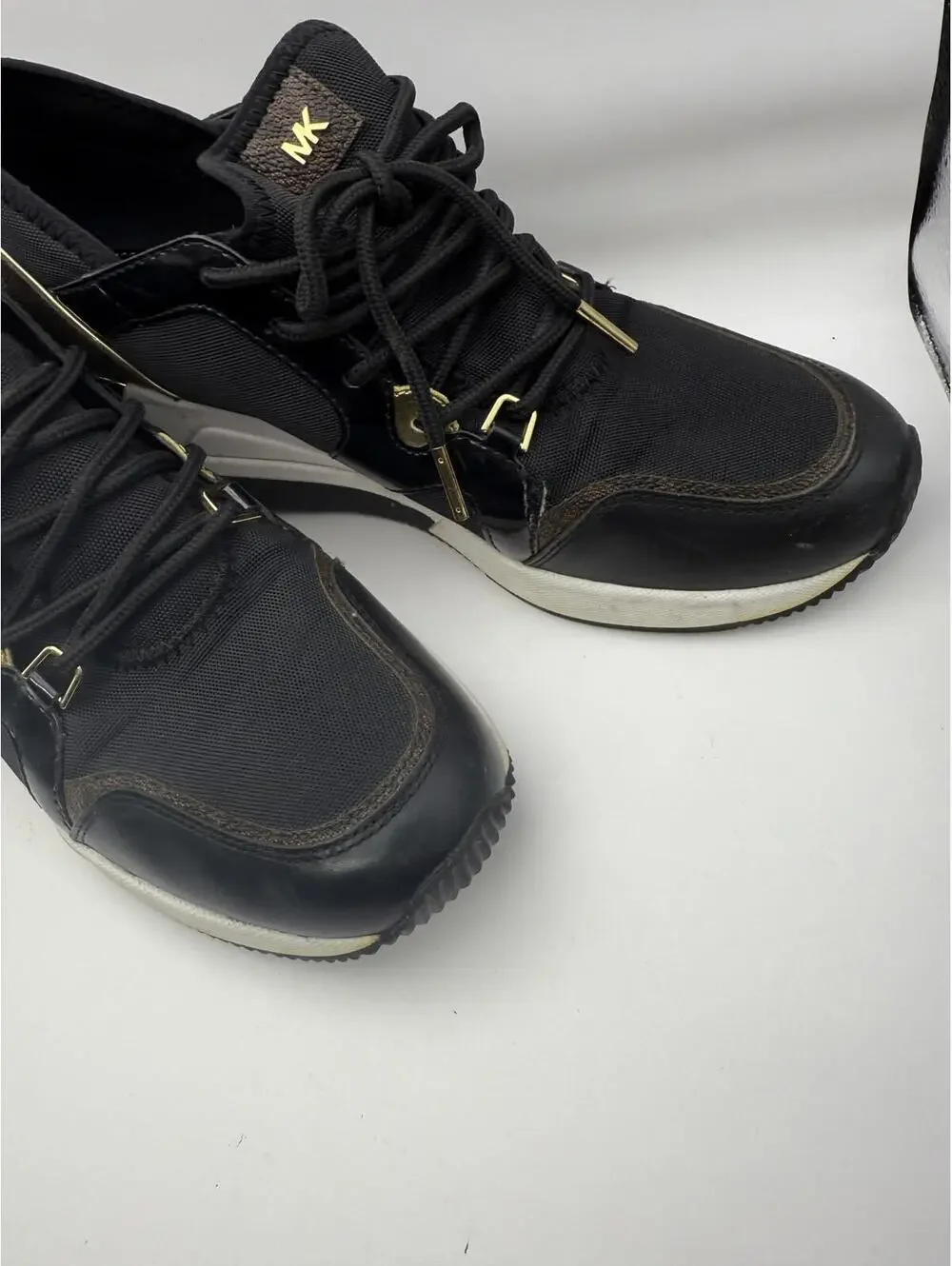 Michael Kors Women's Black and Gold Wedge Sneakers 8.5